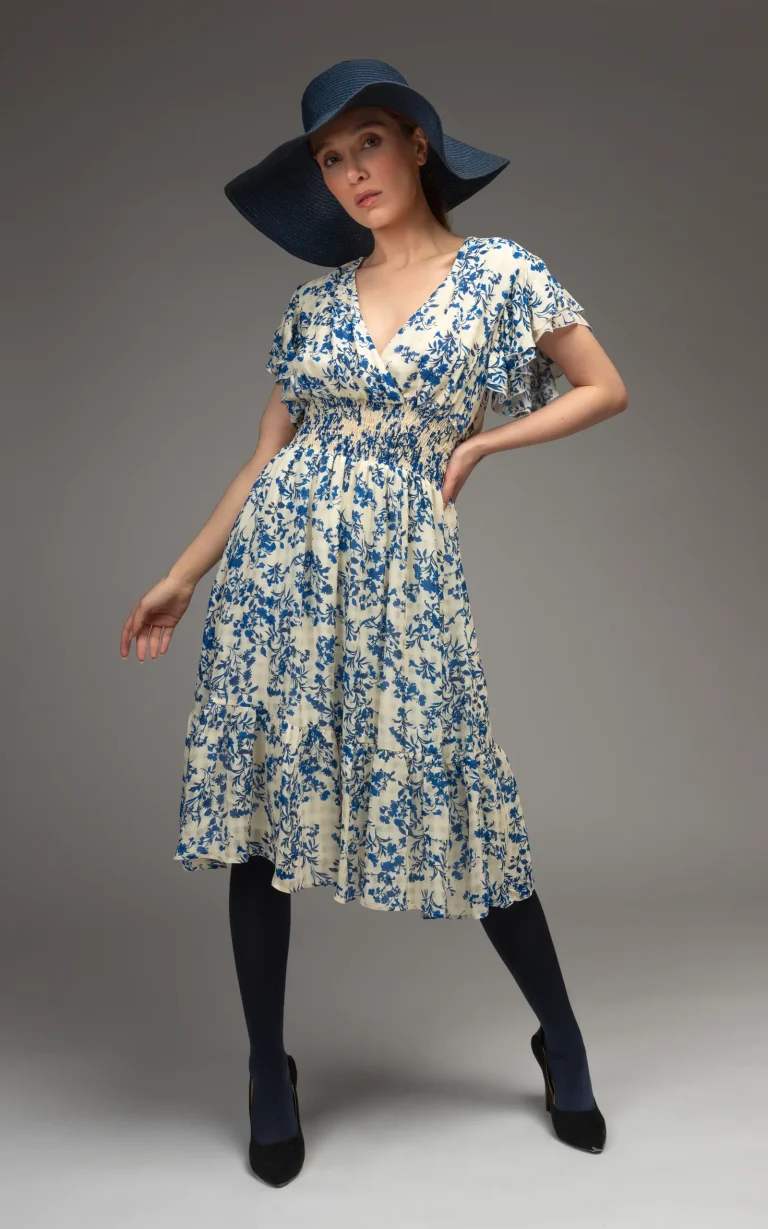 Front view of a Dress by nevado floral Persian blue, white pattern