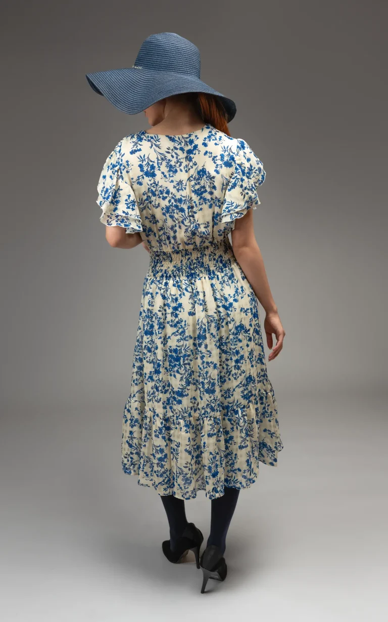 Front view of a Dress by nevado floral Persian blue, white pattern